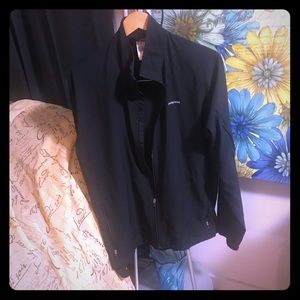 Soft Midnight black Patagonia windbreaker jacket.